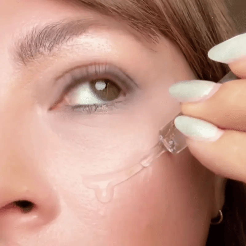 Woman applying Collagen Silk Ampoule