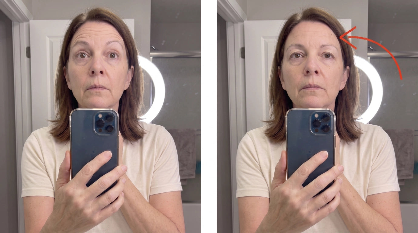 Woman 60+ holding her phone up to check her relaxed forehead lines